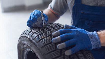 Measuring tread depth on tires
